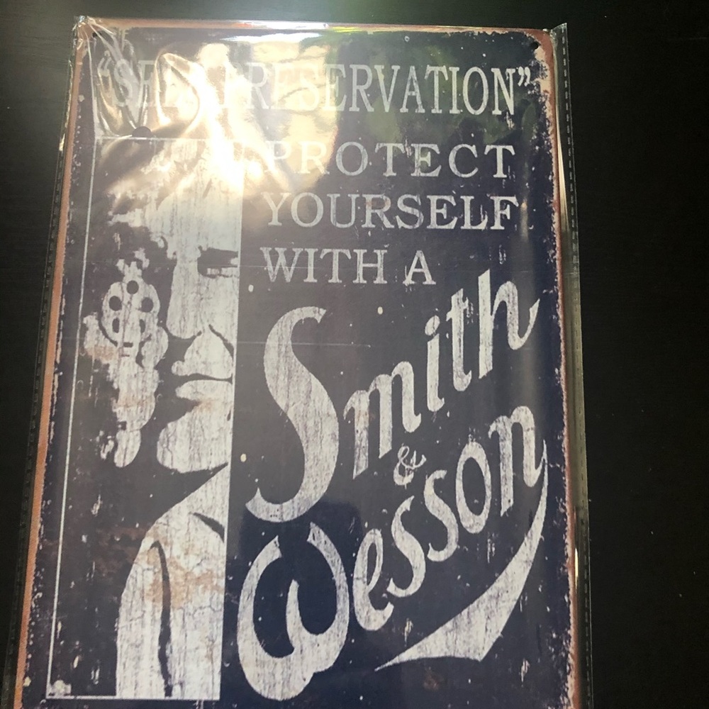 Vintage replica Smith & Wesson metal sign